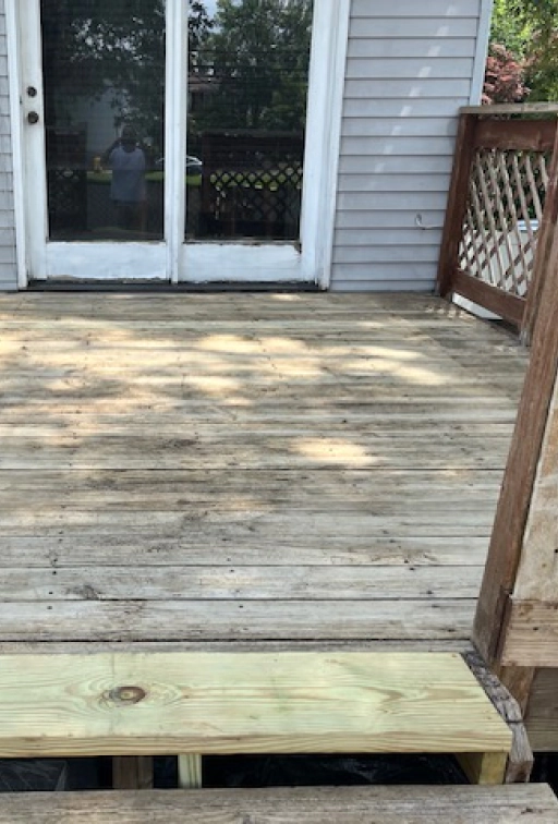 wooden deck area after cleaning